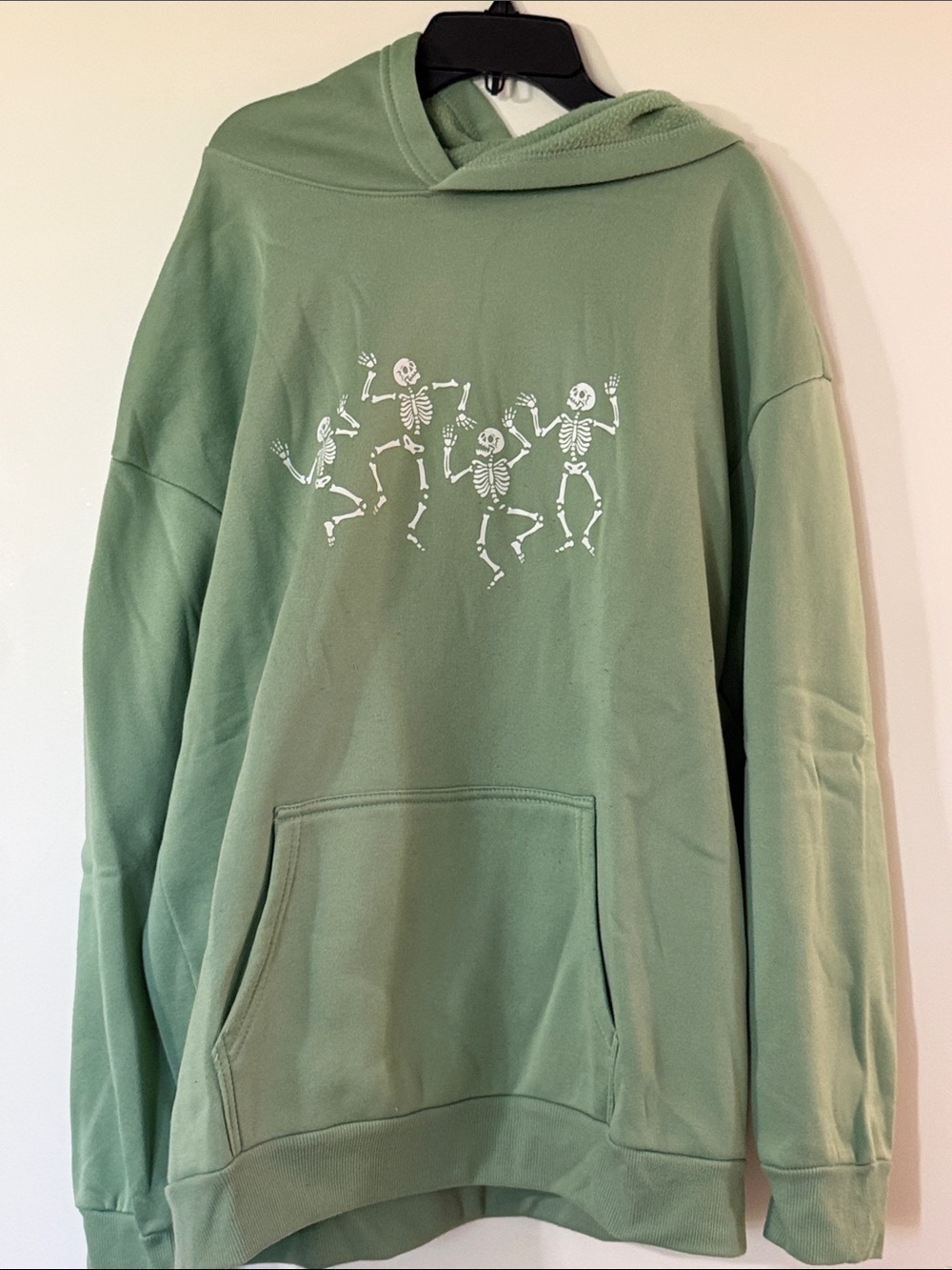 Sage Green Hoodie with White Dancing Skeletons